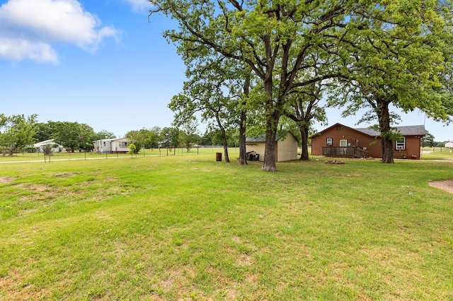 view of yard featuring a deck
