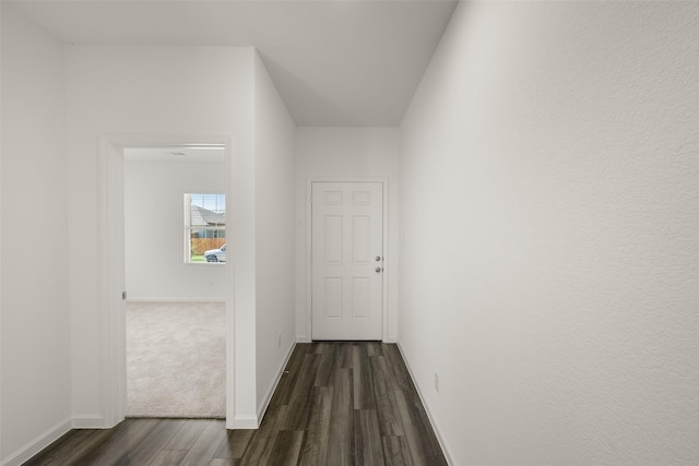 4936 Bass Dr, Fort Worth, TX 76179 - hall featuring dark wood-type flooring and baseboards