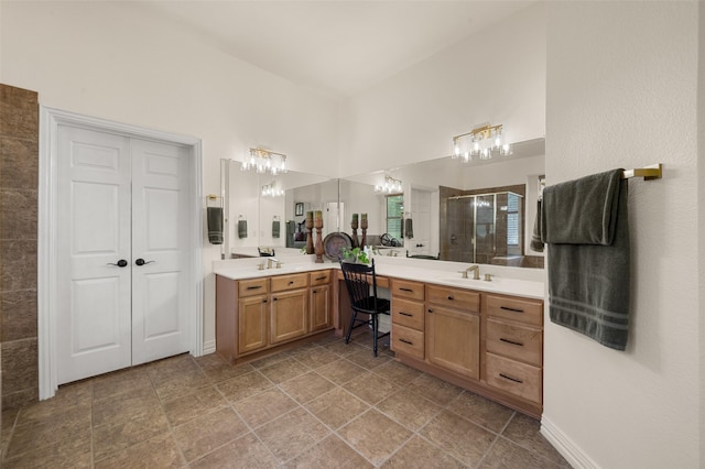 full bathroom with a stall shower, two vanities, and a high ceiling