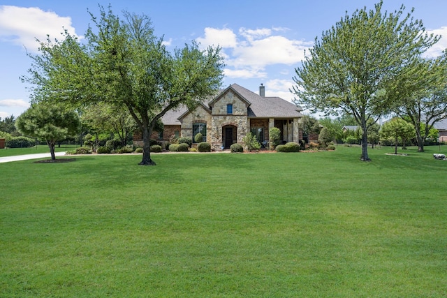 5403 Englenook Dr, Parker, TX 75002 - view of front of house with a chimney, a front lawn, and stone siding