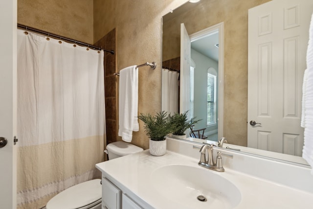 5403 Englenook Dr, Parker, TX 75002 - bathroom with vanity, a textured wall, curtained shower, and toilet