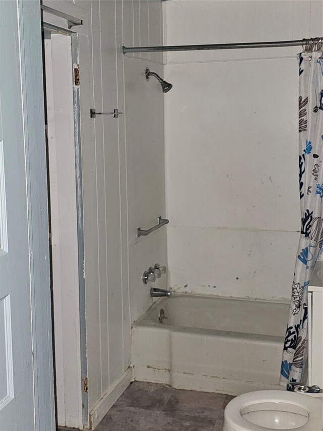 full bathroom with toilet and shower / tub combo