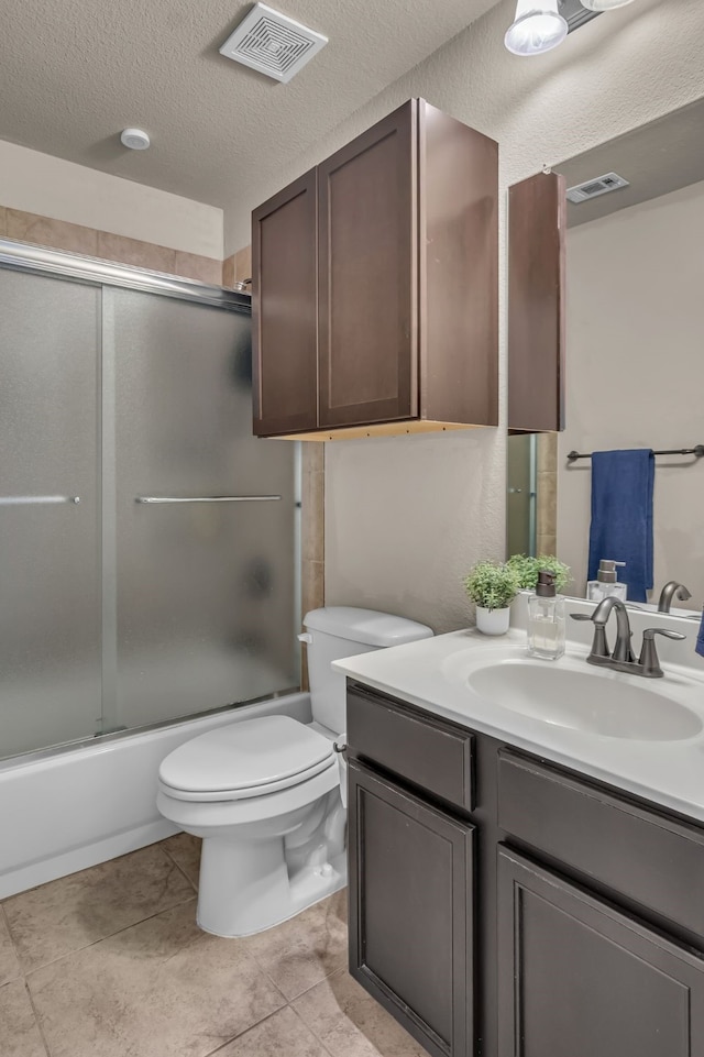 6820 Swallow Ln, North Richland Hills, TX 76182 - bathroom with visible vents, shower / bath combination with glass door, toilet, and vanity