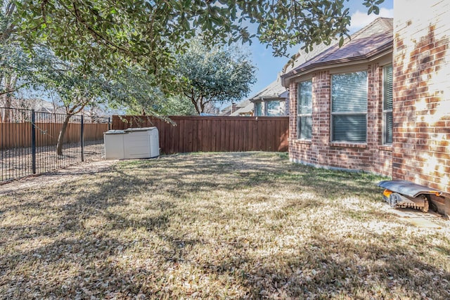 view of yard featuring a fenced backyard
