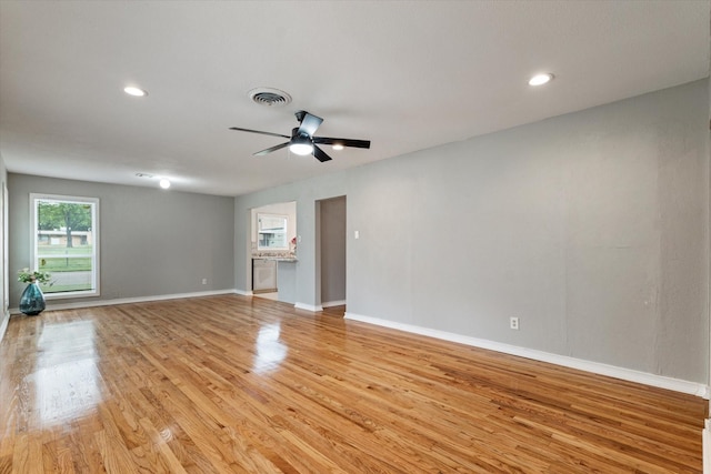 empty room featuring visible vents, baseboards, ceiling fan, recessed lighting, and light wood-style flooring