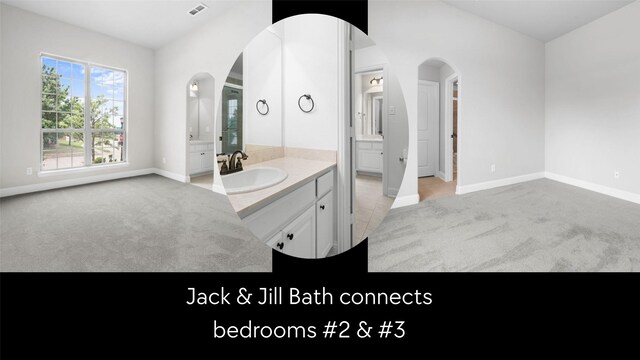bathroom with visible vents, baseboards, and vanity