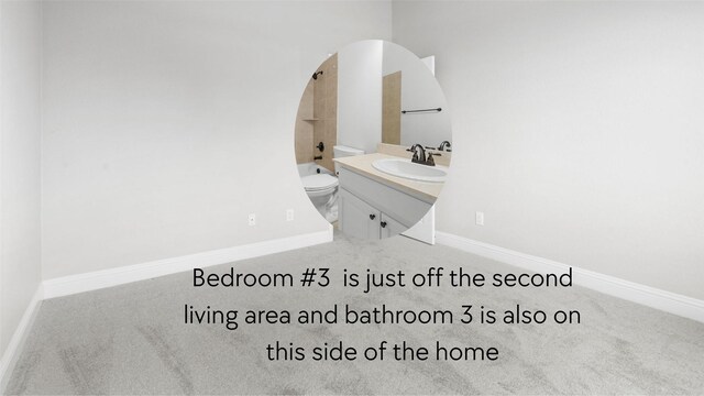 bathroom featuring vanity, baseboards, bathing tub / shower combination, and toilet