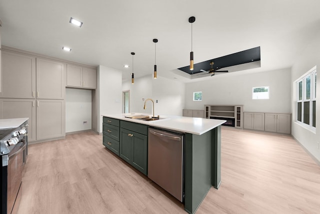 928 College St, Sulphur Springs, TX 75482 - kitchen with dishwasher, light wood-type flooring, light countertops, a sink, and range