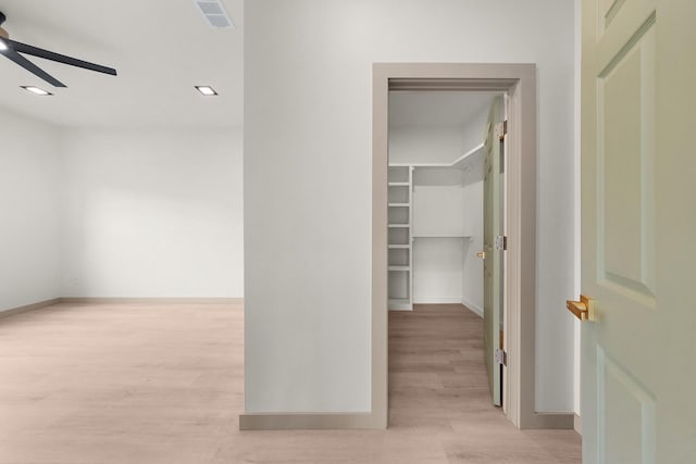 928 College St, Sulphur Springs, TX 75482 - hallway featuring recessed lighting, baseboards, visible vents, and light wood-style floors