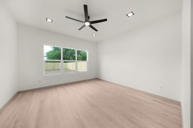 928 College St, Sulphur Springs, TX 75482 - spare room with baseboards, a ceiling fan, recessed lighting, and wood finished floors