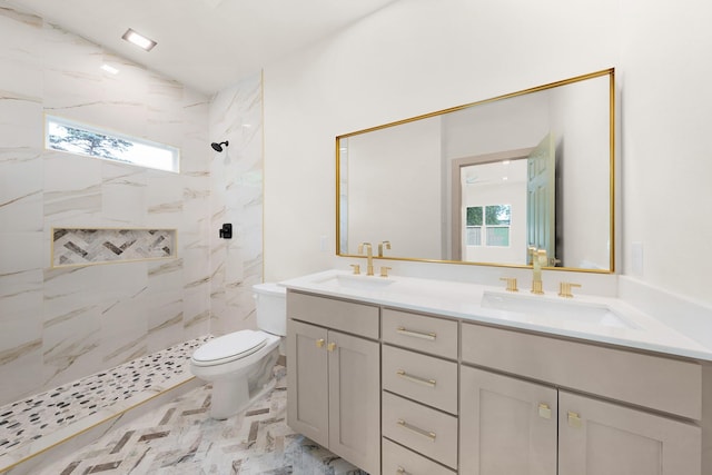 928 College St, Sulphur Springs, TX 75482 - bathroom with a sink, a marble finish shower, toilet, and double vanity