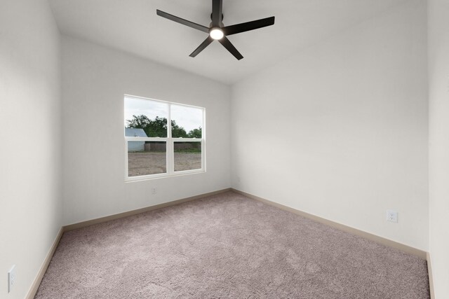 928 College St, Sulphur Springs, TX 75482 - carpeted spare room featuring baseboards and a ceiling fan
