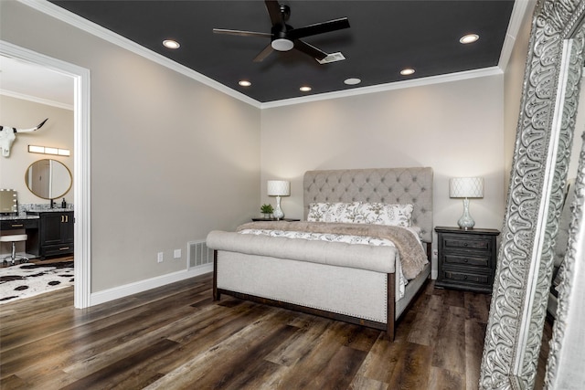 bedroom with crown molding, baseboards, recessed lighting, and wood finished floors