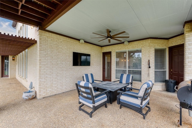 view of patio / terrace featuring outdoor dining area and ceiling fan