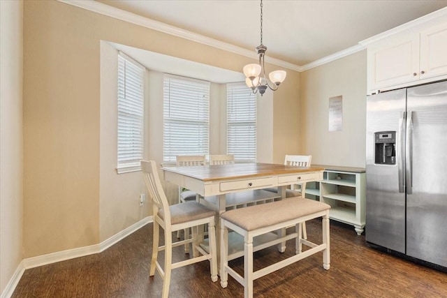 309 Nash Dr, Hewitt, TX 76643 - dining space featuring baseboards, a chandelier, ornamental molding, and dark wood-type flooring