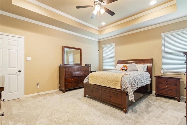 309 Nash Dr, Hewitt, TX 76643 - bedroom with a ceiling fan, crown molding, a raised ceiling, baseboards, and light carpet