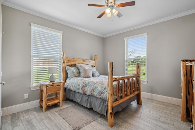 bedroom with light wood-style floors, baseboards, ornamental molding, and ceiling fan