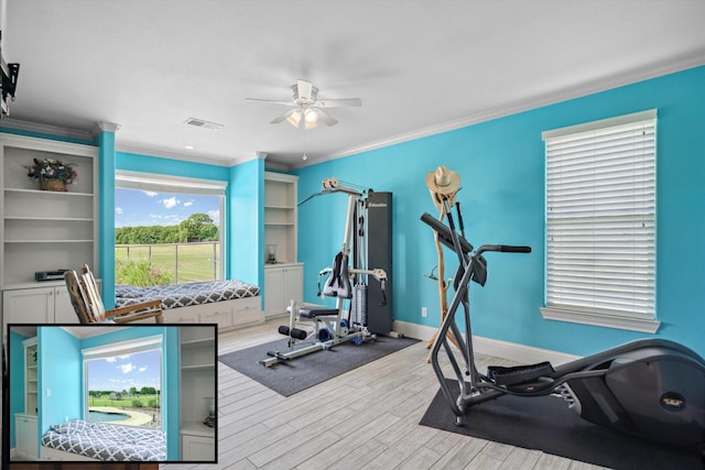 workout room featuring baseboards, a ceiling fan, light wood finished floors, and ornamental molding