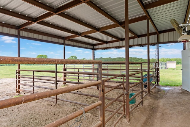 view of stable featuring a rural view
