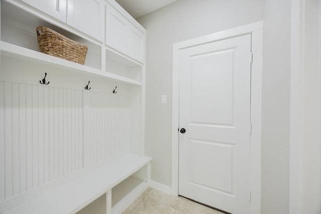 3600 Howard St, Fort Worth, TX 76119 - mudroom featuring light tile patterned floors and baseboards