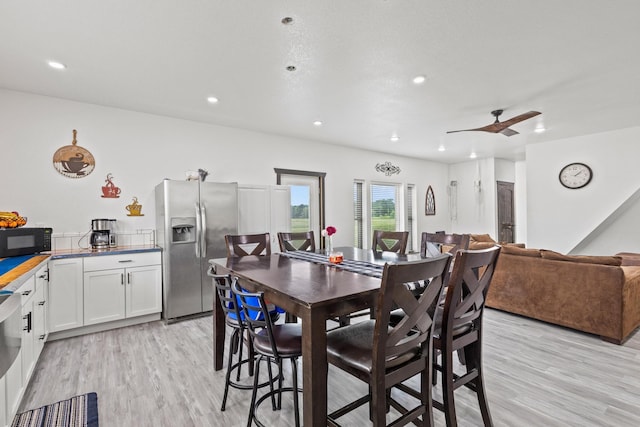 dining room with recessed lighting, ceiling fan, and light wood-style floors