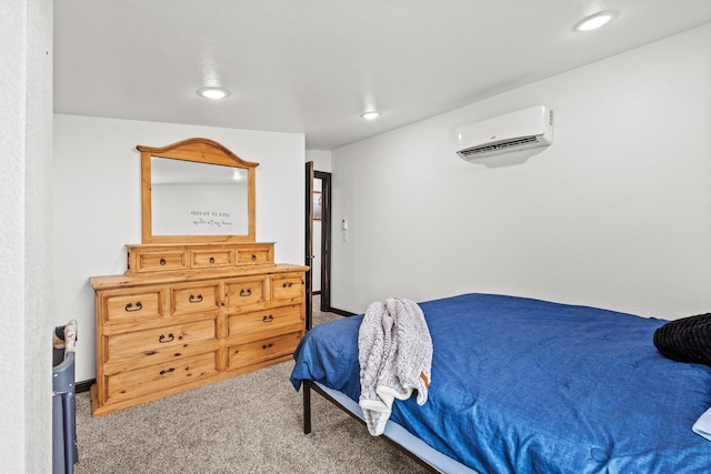 bedroom featuring recessed lighting, a wall unit AC, and carpet