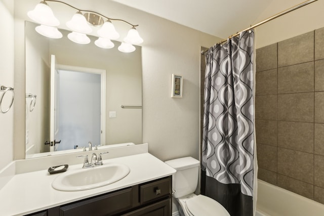 full bath featuring vanity, shower / bath combination with curtain, and toilet
