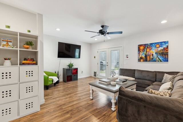 living room featuring recessed lighting, baseboards, ceiling fan, and wood finished floors