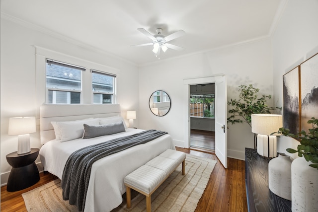 906 N Clinton Ave, Dallas, TX 75208 - bedroom with crown molding, multiple windows, and wood finished floors