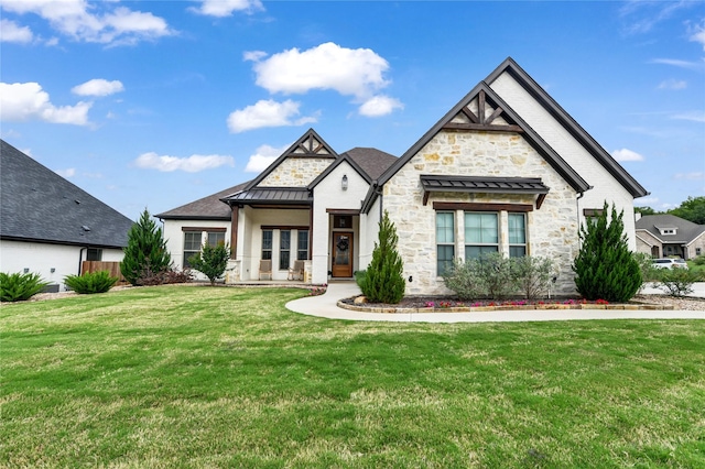 view of front of house with a front lawn, metal roof, stone siding, and a standing seam roof