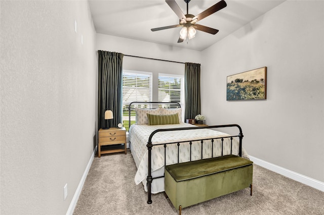 bedroom featuring carpet floors, a ceiling fan, and baseboards