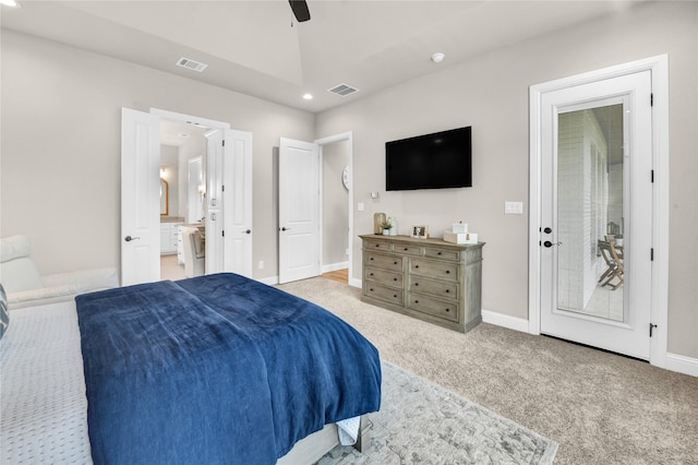 carpeted bedroom featuring recessed lighting, baseboards, visible vents, and ensuite bath