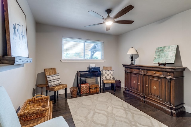 3158 Newcastle Dr, Dallas, TX 75220 - living area featuring baseboards, a ceiling fan, and dark wood-style flooring