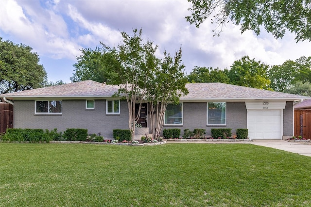 3158 Newcastle Dr, Dallas, TX 75220 - single story home featuring brick siding, driveway, a front yard, and a garage