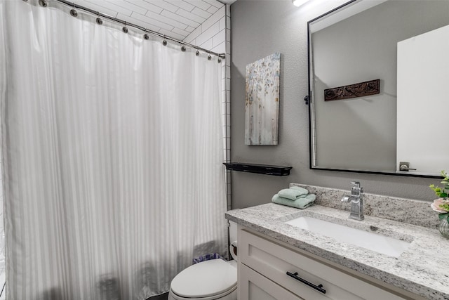 3158 Newcastle Dr, Dallas, TX 75220 - bathroom featuring vanity, toilet, and curtained shower