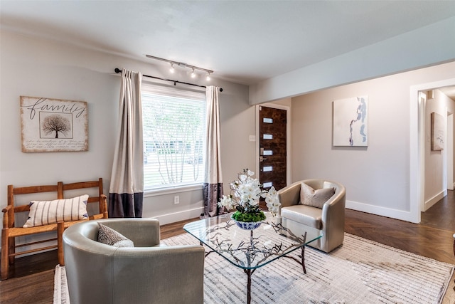 3158 Newcastle Dr, Dallas, TX 75220 - living room featuring baseboards and rail lighting