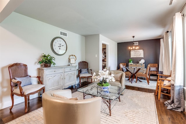 3158 Newcastle Dr, Dallas, TX 75220 - living room featuring visible vents and wood finished floors