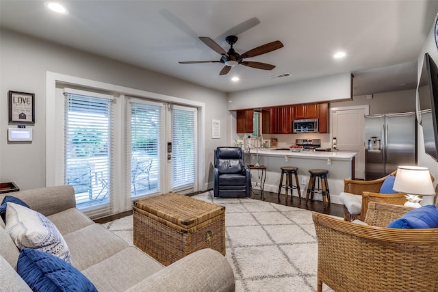 3158 Newcastle Dr, Dallas, TX 75220 - living area with a ceiling fan, visible vents, light wood-style flooring, and recessed lighting