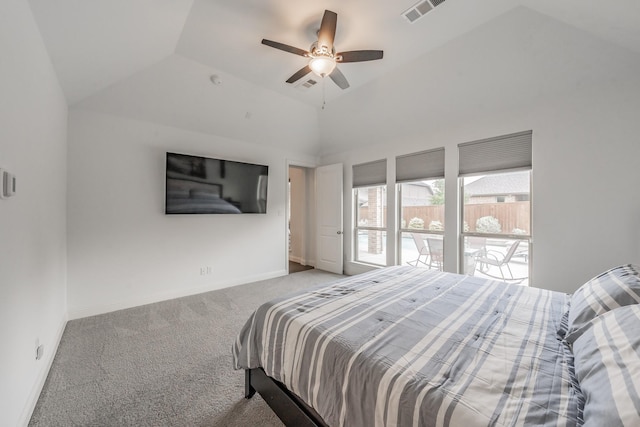carpeted bedroom featuring visible vents, baseboards, ceiling fan, and vaulted ceiling
