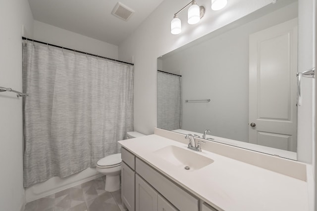bathroom with vanity, shower / bath combo, toilet, and visible vents