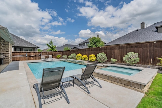 view of pool with a fenced in pool, a patio, an in ground hot tub, and a fenced backyard