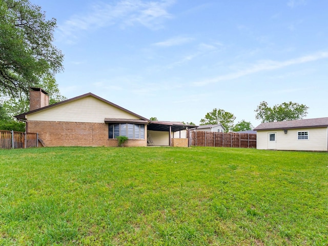 view of yard featuring fence