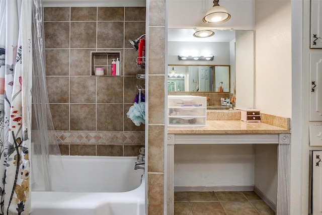 full bath featuring tile patterned floors, shower / bath combination with curtain, and vanity