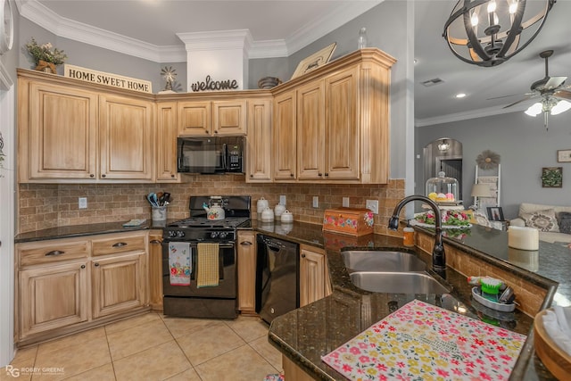 kitchen featuring a sink, ceiling fan with notable chandelier, light tile patterned floors, backsplash, and black appliances