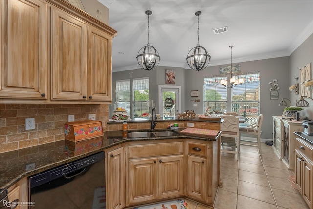 kitchen with visible vents, a sink, a peninsula, an inviting chandelier, and black dishwasher