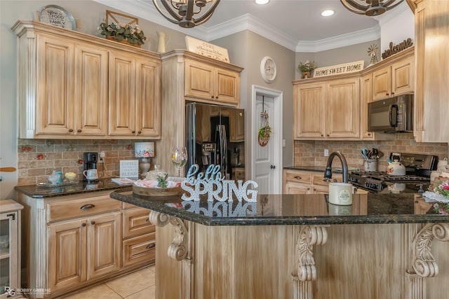 kitchen with decorative backsplash, light brown cabinetry, light tile patterned floors, black appliances, and dark stone counters