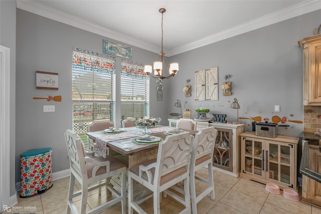 dining space featuring ornamental molding, light tile patterned floors, and a notable chandelier