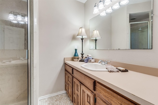 2400 N Shore Dr, Bonham, TX 75418 - bathroom featuring vanity, baseboards, and a shower stall