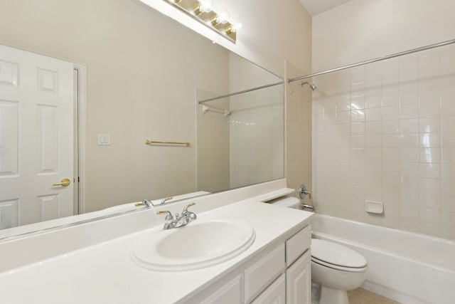 bathroom with vanity, tile patterned flooring, bathing tub / shower combination, and toilet