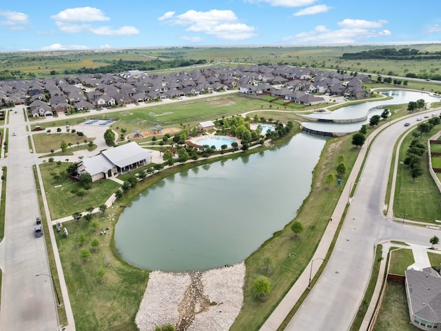 aerial view featuring a residential view and a water view